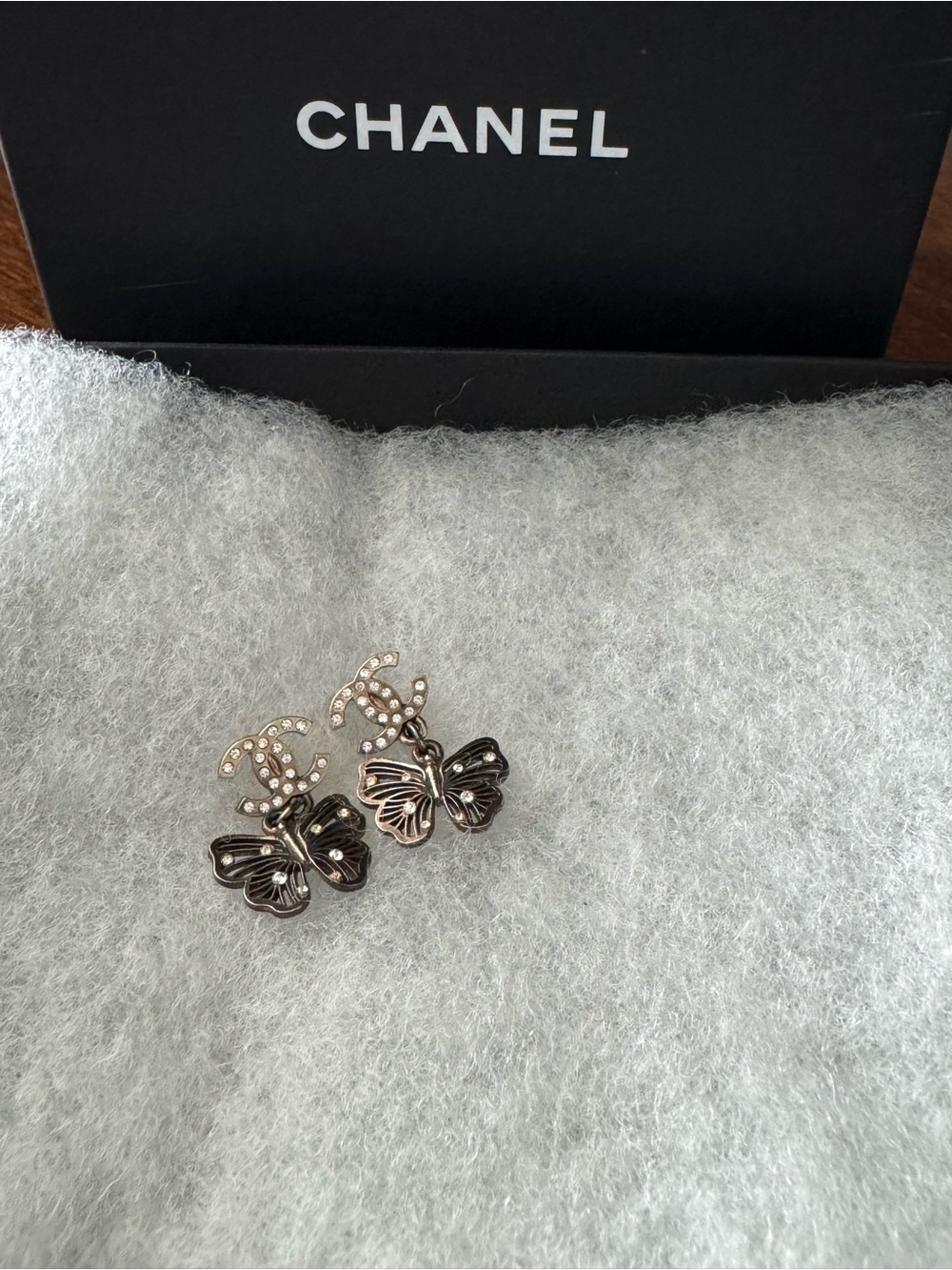 Authentic CHANEL tone butterfly dangle earrings